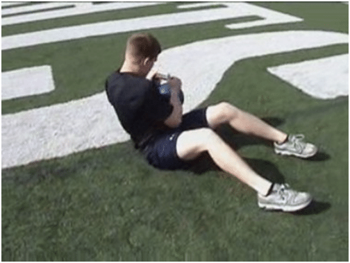 Man doing kettlebell exercise for fitness.