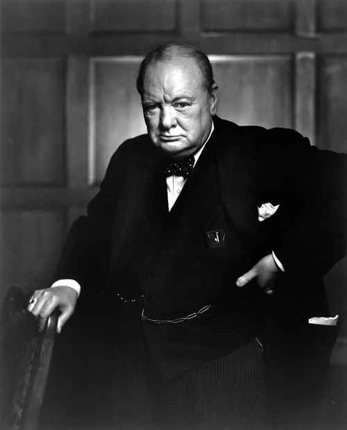 Winston Churchill's portrait while holding chair.