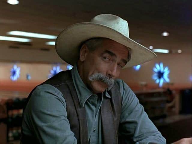 Sam Elliot wearing cowboy hat showing mustache.