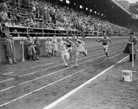 Vintage men sprinting in the race.
