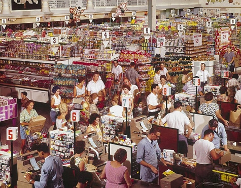 Vintage grocery store being crowded.