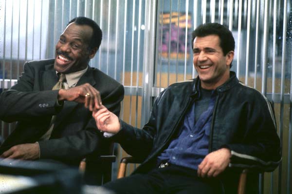 Lethal Weapon movie scene of Mel Gibson and Danny Glover.