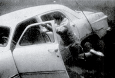 Man escaping from a sinking car.