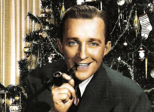 Bing Crosby smoking a pipe in front of christmas tree illustration.