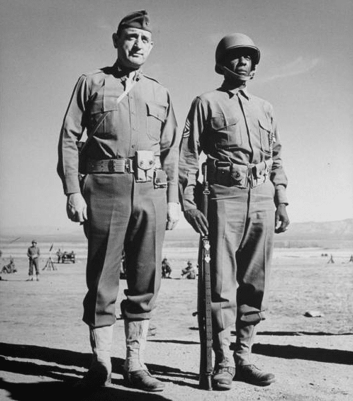 Vintage soldiers standing in the dessert.