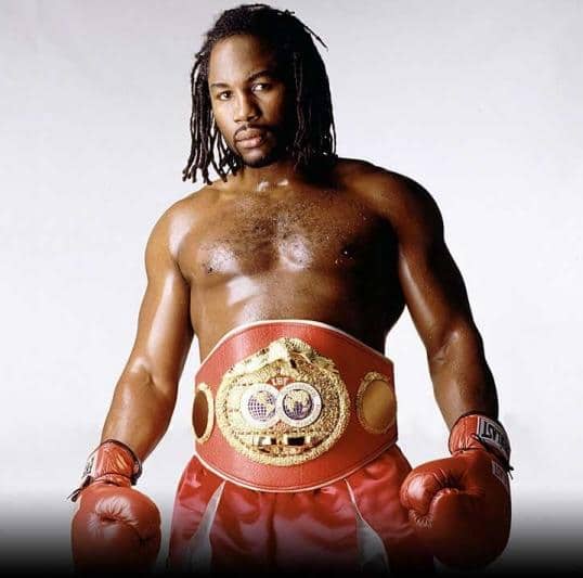 Lennox Lewis boxer boxing portrait wearing champion belt.