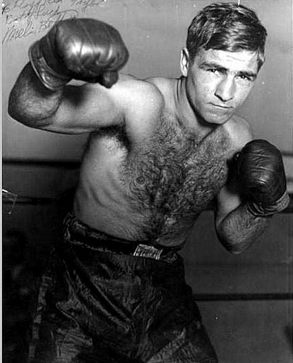 Vintage Melio Bettina give boxer posing portrait.