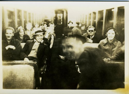 Vintage blurry subway train passengers portrait.