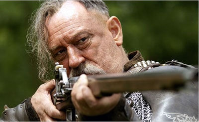 Ukrainian Cossack haircut pointing gun
