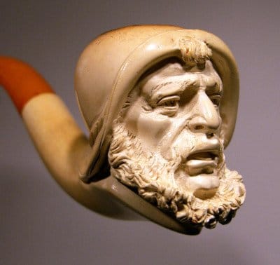 Sea captain carving fitted in meerschaum pipe.