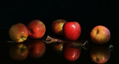 Red apples placed on the table.