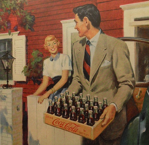 Man arriving at home with case of coca cola painting.