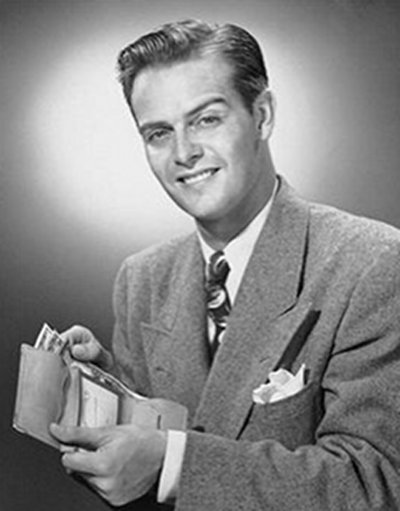 Vintage man in suit holding money in wallet.