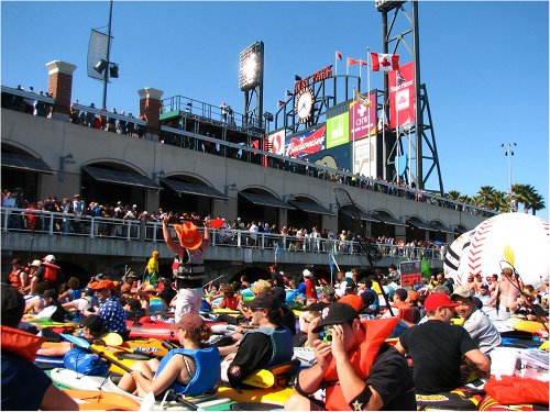 People enjoying MLB games fair.