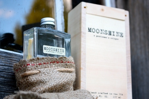 Moonshine cologne bottle with cover box. 