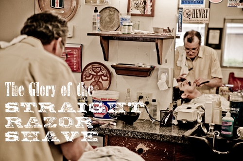 Man getting straight razor shave in barbershop. 