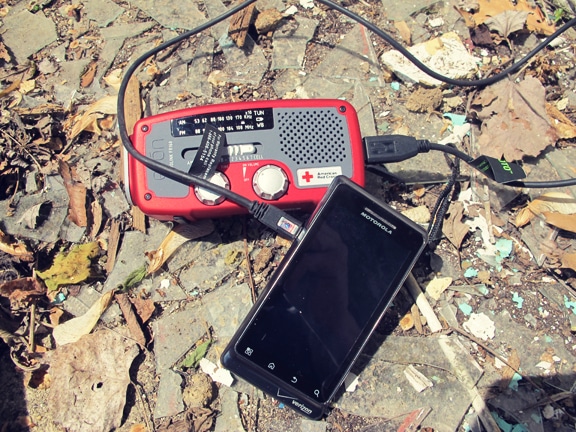 Using emergency radio for charging cell phone.