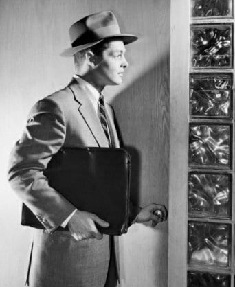 Vintage man holding resume and wearing hat illustration.