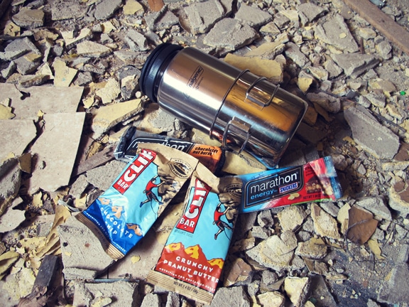 A water bottle and food placed in disaster house.