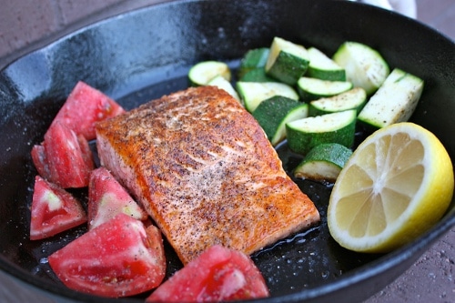 Cast iron pan seared salmon lemon zucchini.