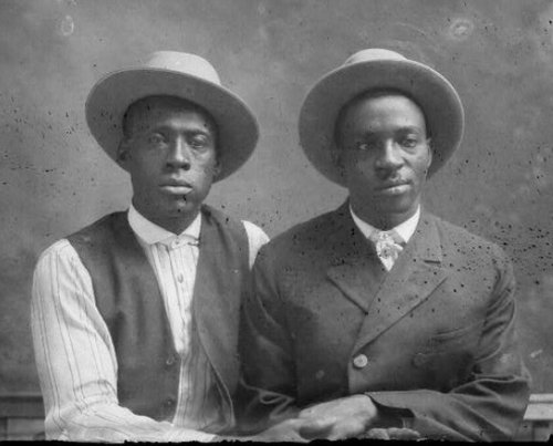 Vintage two men wearing hats black and white photo illustration.