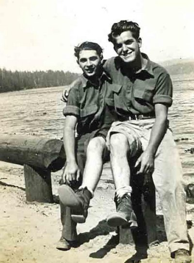 Vintage two young men are sitting and smiling black and white illustration.