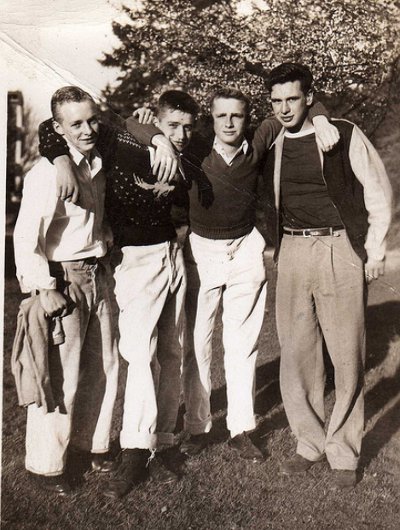 Vintage four young men standing black and white photo illustration.