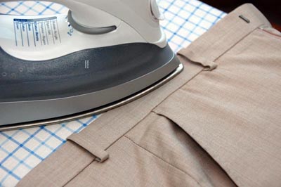 Ironing pants trousers iron top waistband.