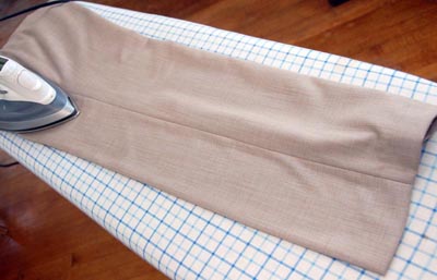 Iron pant trousers ironing leg next to seam.