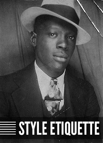 Vintage african american man in suit hat style etiquette.