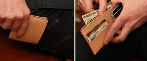 DIY homemade wallet man putting into his pocket and taking out cash.