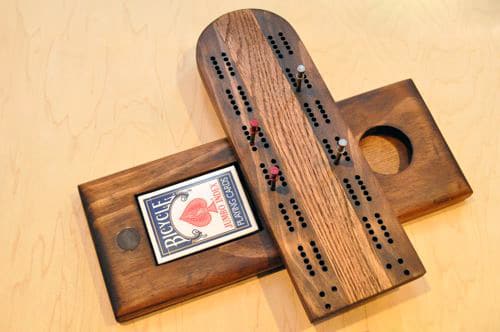 Homemade wooden cribbage board swivel. 