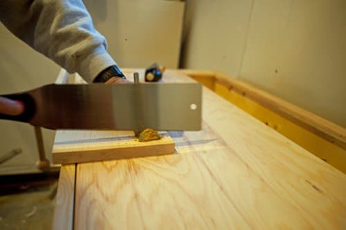 diy homemade coat hook from tree branch trimming ends