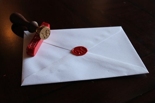 Wax seal envelope with stamp. 