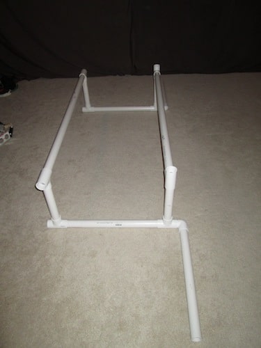 Step 4: Insert your two 4 foot 3 inch section as your cross bars as shown below. 