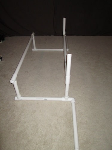 Step 5: Insert two 1 foot sections on top of the T sections.