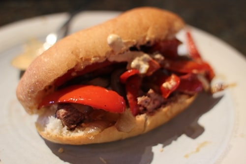 Beer marinated steak sandwich on hoagie roll.