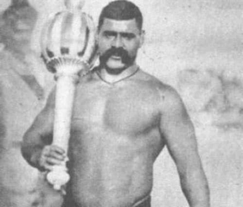 Great Gama wrestler with giant mace.