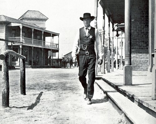 High noon movie old western gary cooper walking downtown.