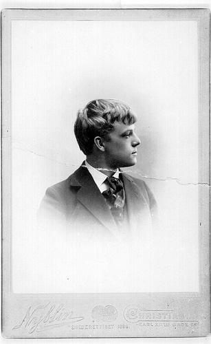 Vintage young man portrait side profile view of face.