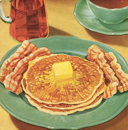 Vintage illustration pancakes bacon on plate. 