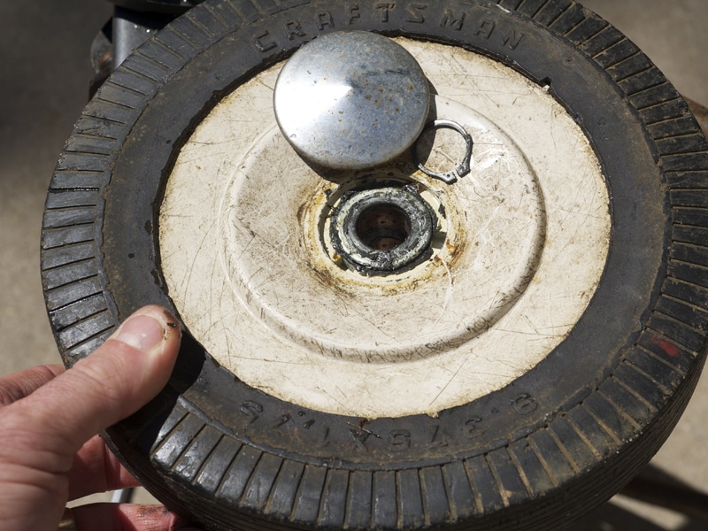 Reel mower remove drive wheel for sharpening.