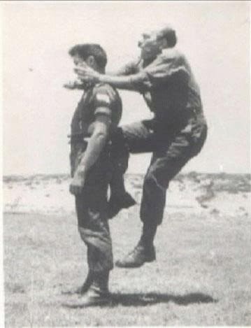 Imi Lichtenfeld, founder of Krav Maga practicing moves on soldier.