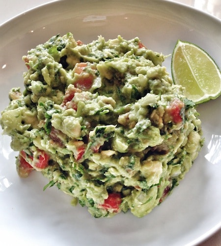 Loaded guacamole red onion tomato cilantro lime.