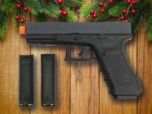 Airsoft gun with christmas background.