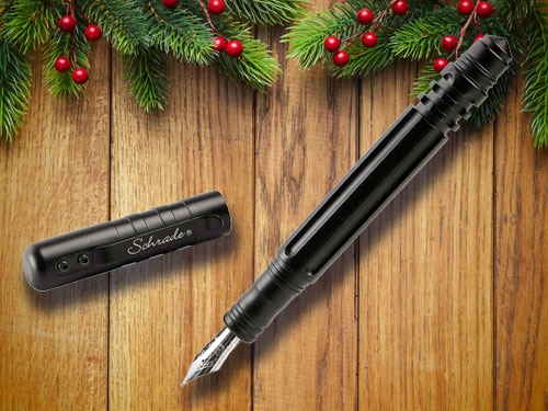 Tactical fountain pen with christmas background.