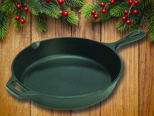 Cast iron skillet with christmas background.