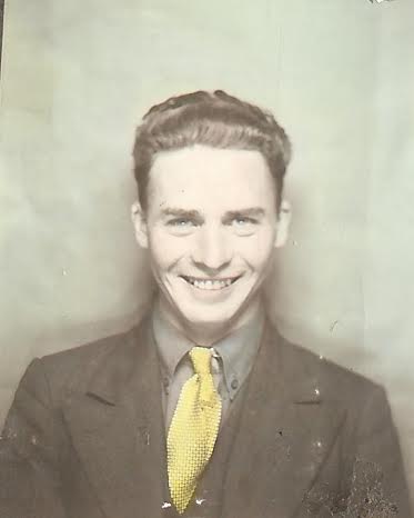 bob lynes vintage young man portrait chest up suit and tie big smile