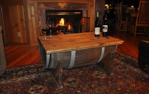 Homemade diy whiskey barrel coffee table.