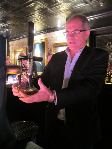 Guinness Master Brewer Fergal Murray pouring guinness beer